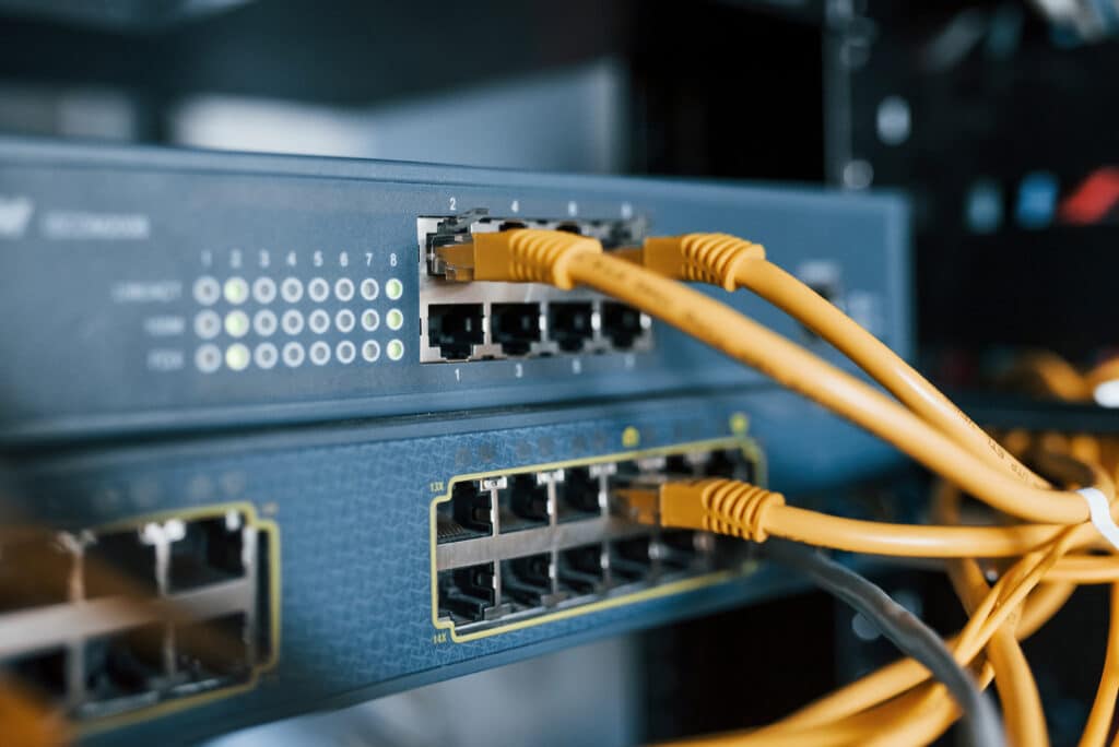 Close up view of internet equipment and cables in the server room